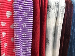 Embossed stripe flannel blanket