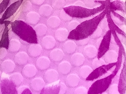 Embossed double-sided blankets